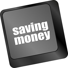 Image showing saving money for investment with a button on computer keyboard