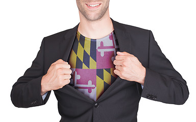 Image showing Businessman opening suit to reveal shirt with state flag