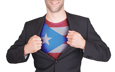 Image showing Businessman opening suit to reveal shirt with state flag