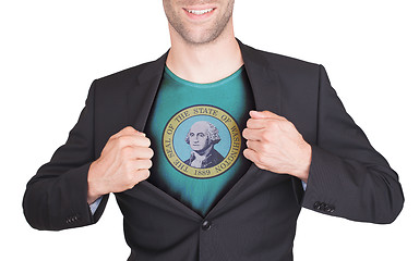 Image showing Businessman opening suit to reveal shirt with state flag