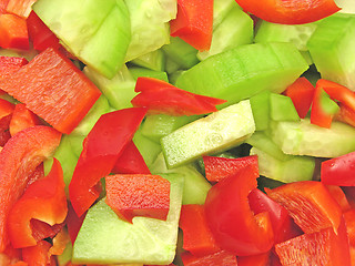 Image showing Slices of cucumber and red pepper in a close-up view