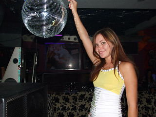 Image showing The nice girl dances in a night club