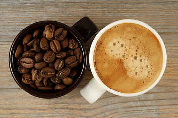 Image showing two cups of coffee and beans