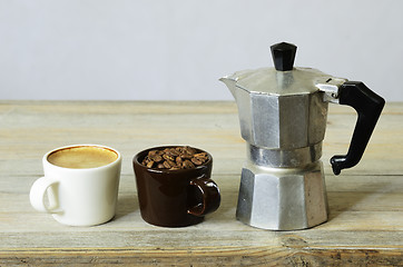 Image showing two cups of coffee and beans and percolator