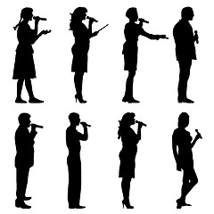 Image showing Black silhouettes of  mans and womans singing karaoke on white b