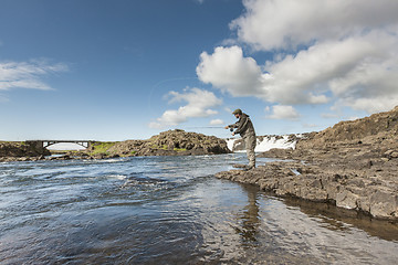 Image showing Flyfisherman casting