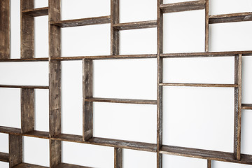 Image showing Rustic style shelves on white wall