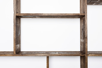 Image showing Rustic style shelves on white wall