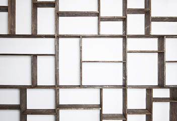 Image showing Rustic style shelves on white wall