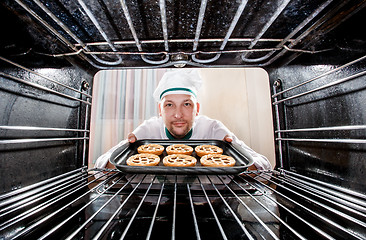 Image showing Chef cooking in the oven.