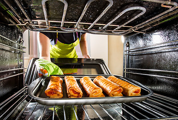 Image showing Cooking in the oven at home.