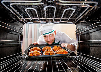 Image showing Chef cooking in the oven.