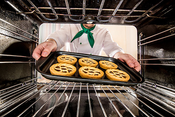 Image showing Chef cooking in the oven.