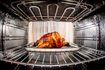 Image showing Roast chicken in the oven.