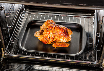 Image showing Roast chicken in the oven.