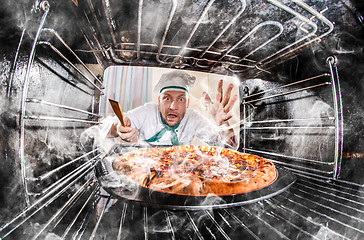 Image showing Funny chef perplexed and angry. Loser is destiny!