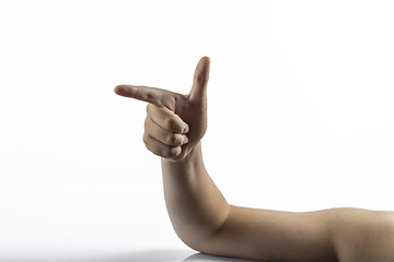 Image showing Young hands makes gun sign