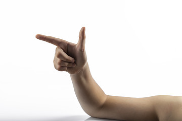 Image showing Young hands makes gun sign