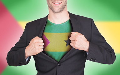 Image showing Businessman opening suit to reveal shirt with flag