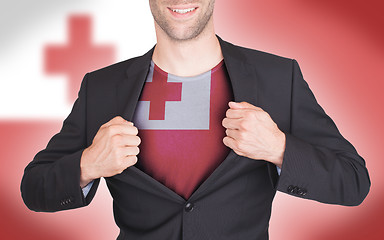 Image showing Businessman opening suit to reveal shirt with flag