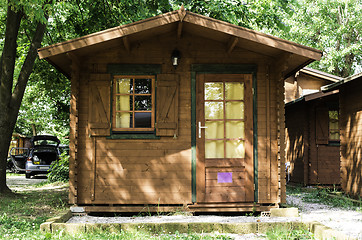 Image showing Wooden bungalows on campsite camping