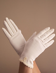 Image showing woman modeling vintage formal white gloves