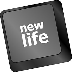 Image showing black keyboard keys with new life words