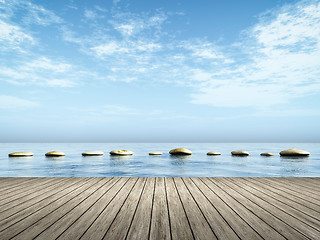 Image showing step stones in the blue sea