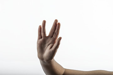 Image showing Young hands make Vulcan Salute