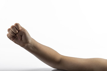 Image showing Young hands make a fist gesture