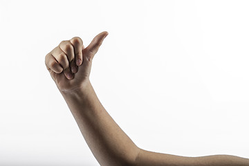 Image showing Young hand make hitchhiking gesture