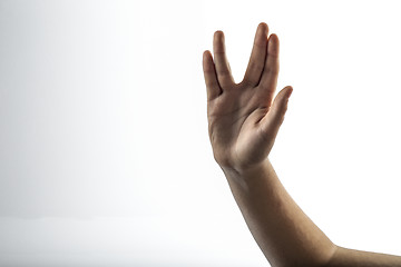 Image showing Young hands make Vulcan Salute
