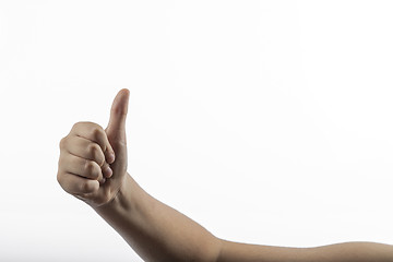 Image showing Young hand make hitchhiking gesture