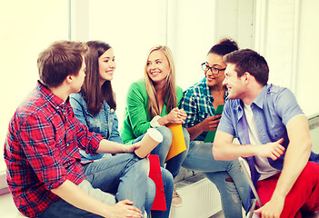 Image showing students communicating and laughing at school