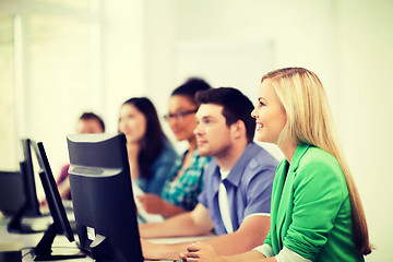 Image showing students with computers studying at school