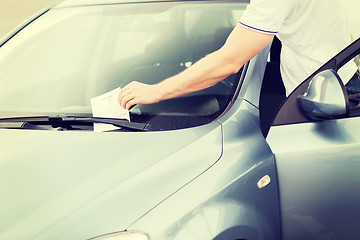 Image showing parking ticket on car windscreen