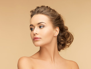 Image showing beautiful woman with pearl earrings