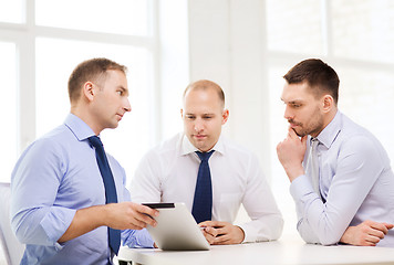 Image showing business team working with tablet pc in office
