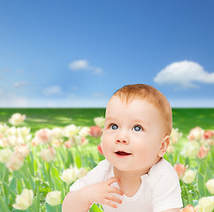 Image showing smiling baby looking up