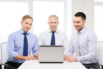 Image showing business team working with laptop in office