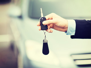 Image showing man with car key outside