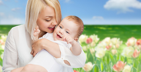 Image showing happy mother with smiling baby