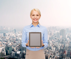 Image showing businesswoman with blank black tablet pc screen