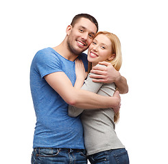 Image showing smiling couple hugging