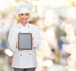 Image showing smiling female chef with tablet pc blank screen