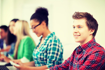 Image showing student with computer studying at school