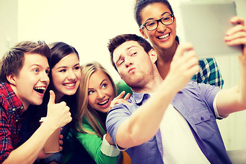 Image showing students making picture with tablet pc at school