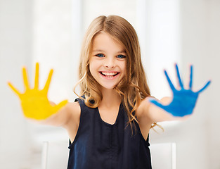 Image showing girl showing painted hands