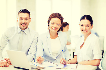 Image showing business team discussing something in office