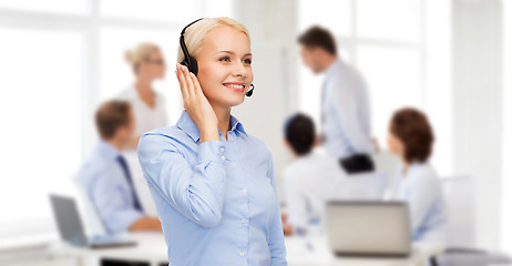 Image showing friendly female helpline operator